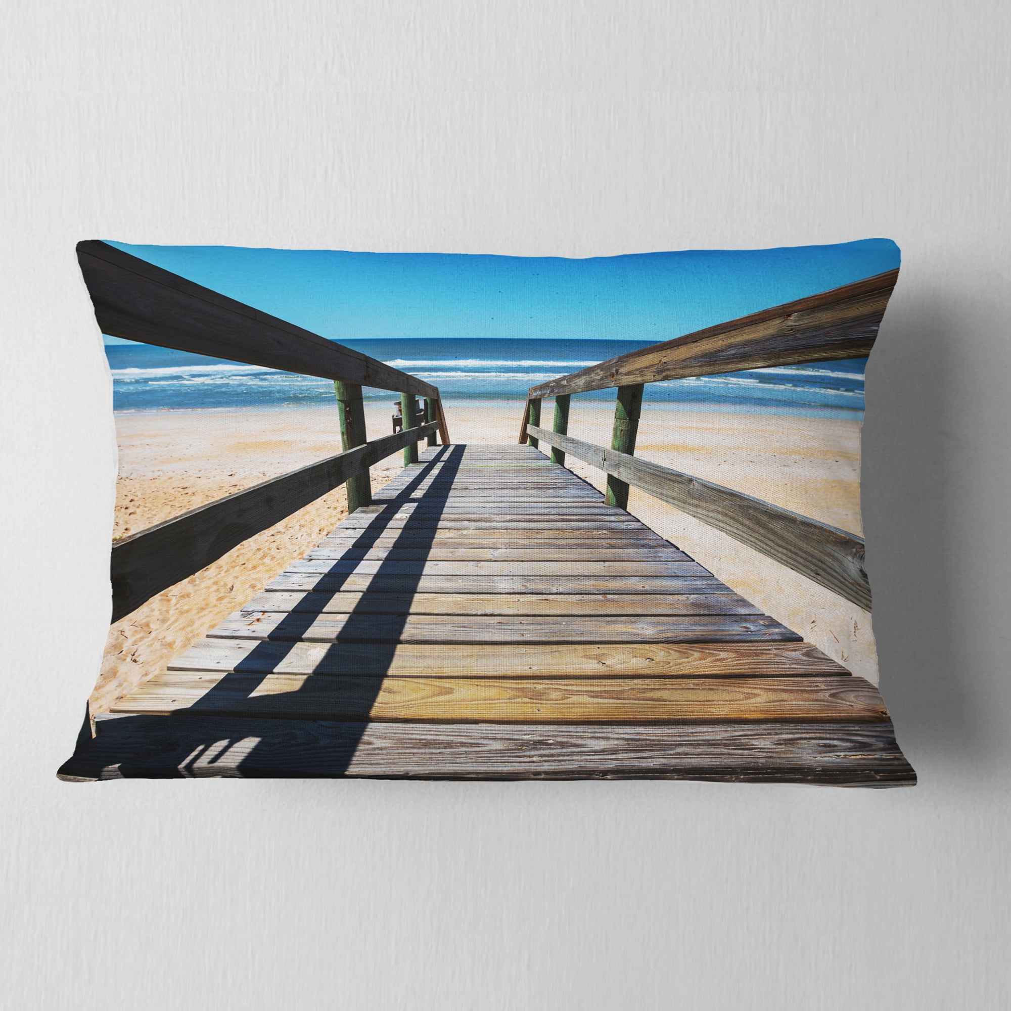 Designart Long Boardwalk into Blue Seashore - Seashore Throw Pillow - 12x20
