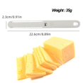 thumbnail image 4 of Diseño Cortador de queso de doble alambre, corta fácilmente rebanadas de queso más gruesas o más delgadas, desde quesos semiblandos hasta quesos duros, con solo un giro., 4 of 5