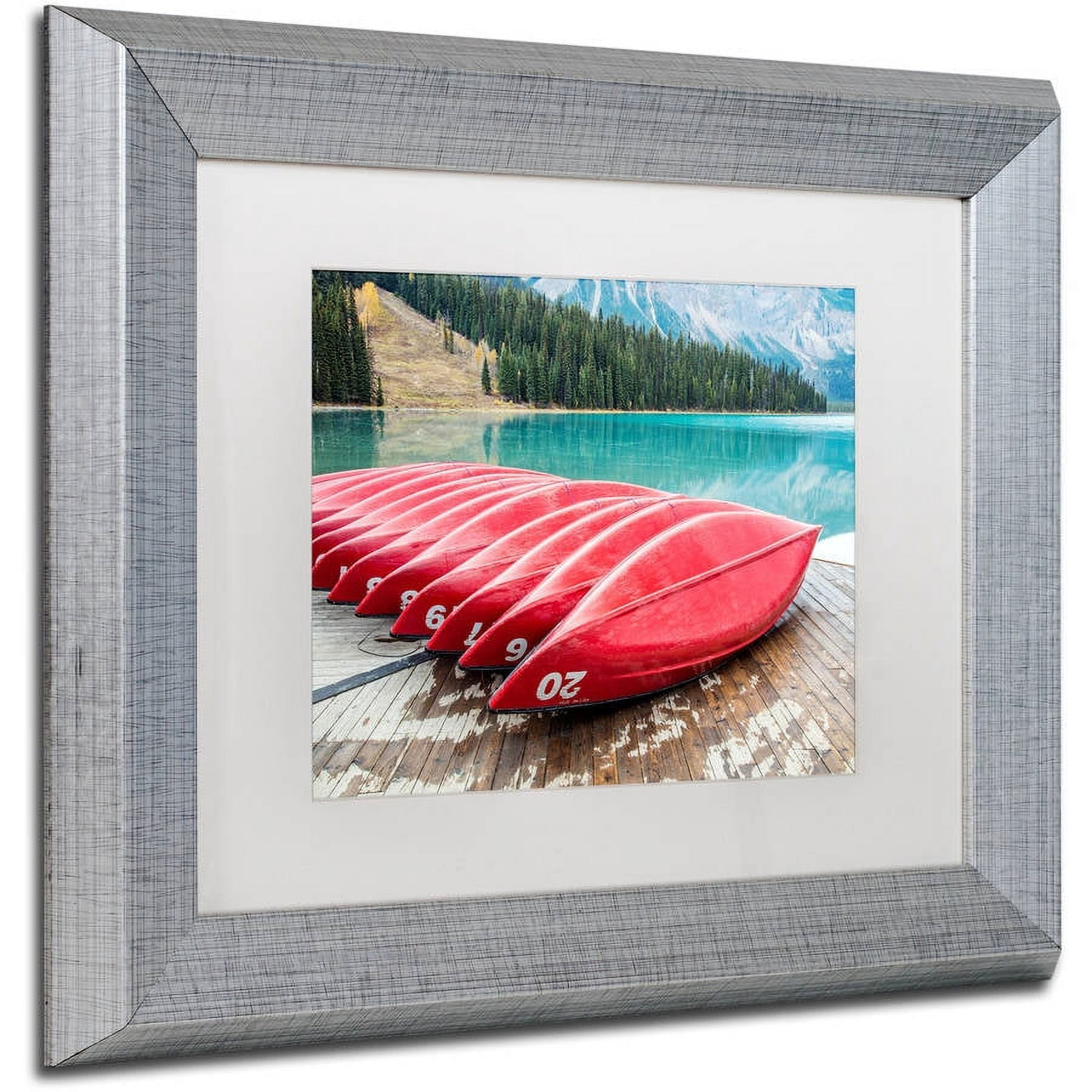 Trademark Fine Art 'Red Canoes of Emerald Lake' Canvas Art by Pierre Leclerc, White Matte, Silver Frame