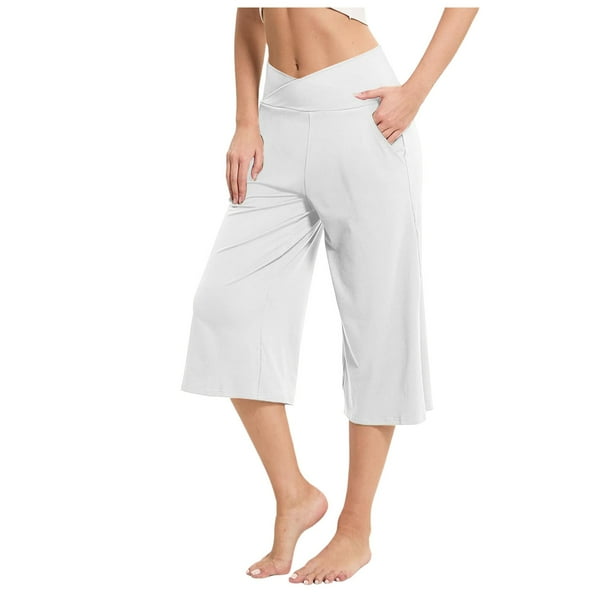 Pantalones cortos de verano con bolsillos para mujer: pantalones informales de poliéster con cintura elástica y color liso.