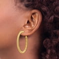 thumbnail image 3 of Primal Gold 14 Karat Yellow Gold 4x35mm Twisted Round Omega Back Hoop Earrings, 3 of 4