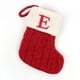 thumbnail image 1 of Medias navideñas personalizadas con letras del alfabeto: calcetines de dulces festivos con lazo para colgar, ideales para decorar el árbol y regalar en las fiestas., 1 of 2