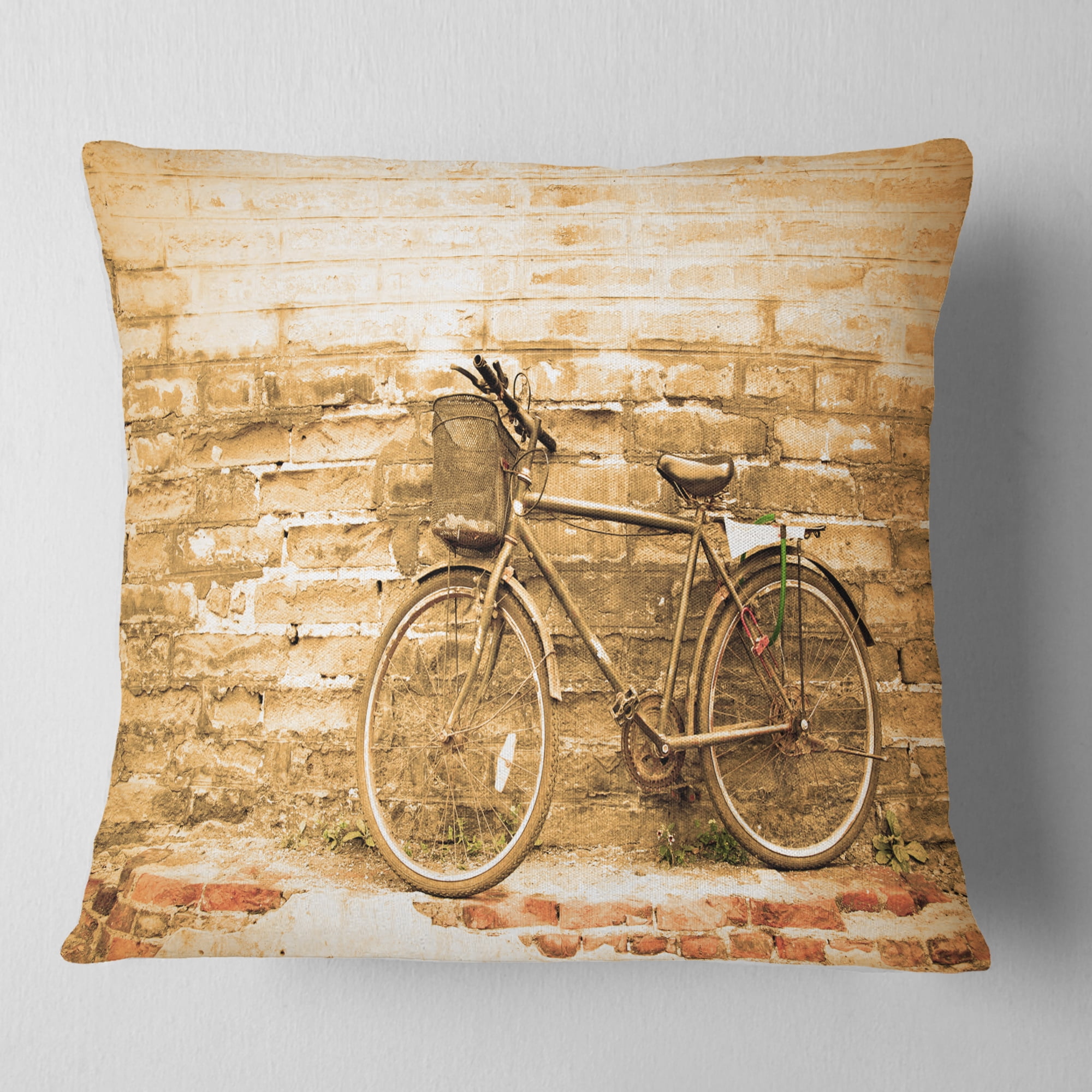 Designart Vintage Bicycle against Brown Wall - Landscape Printed Throw Pillow - 16x16