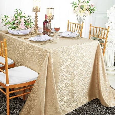 

Wedding Linens Inc. 90 x 132 Seamless Rectangular Marquis Damask Jacquard Polyester Linen Tablecloth - Champagne
