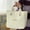 Beige, variant on Ikohbadg Canvas Tote Bag for Lunch Box and Bento, Fashionable Contrast Color Handbag for Office Workers, Spacious Canvas Lunch Bag with Sturdy Handles