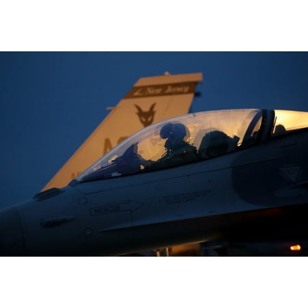 - LAMINATED POSTER A U.S. Air Force F-16 Fighting Falcon pilot from the 177th Fighter Wing readies his aircraft for a t Poster Print 24 x 36