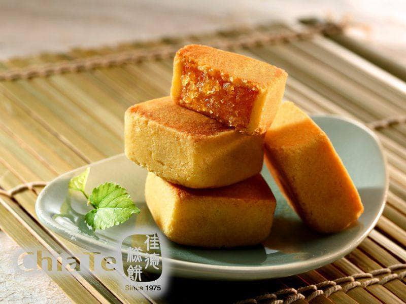 Premium Photo | Pineapple cake sweet traditional taiwanese pastry  containing butter flour egg sugar and pineapple jam