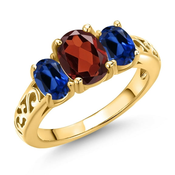 Gem Stone King 18K Yellow Gold Plated Silver Red Garnet and Blue Created Sapphire Filigree Style 3 Stone Ring for Women (2.70 Cttw, Oval 8X6MM and 6X4MM) (Size 8)
