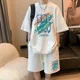thumbnail image 3 of Conjunto de 2 piezas de chándal sencillo con diseño de gofre para hombre y mujer, camiseta y pantalones cortos de diseño urbano holgados de verano, ropa deportiva informal con diseño de parche, 3 of 5