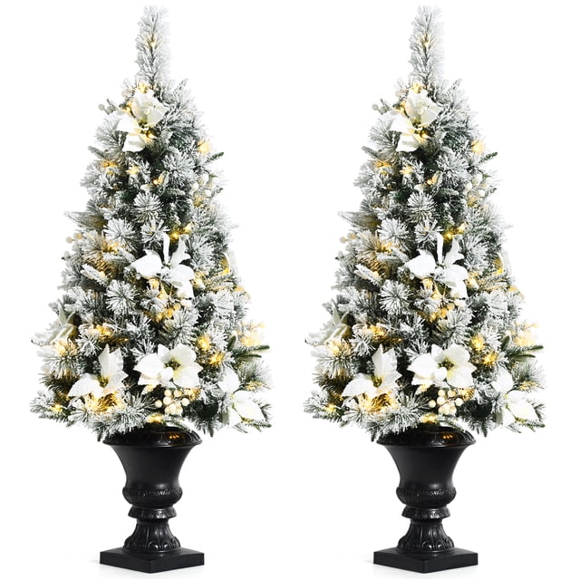 Gymax 2PCS 4 FT Pre-lit Christmas Entrance Tree, artificial snow flocked holiday decor with 223 branch tips, white flowers, berries, and 100 warm white LED lights. Each tree is set in a black urn base, perfect for entryways or festive displays.