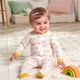 thumbnail image 5 of Pijama enterizo Sleep 'N Play con pies para bebé niña Gerber, floral dorado, 0-3 meses, 5 of 6