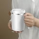 thumbnail image 5 of Taza térmica de acero inoxidable con asa | Taza de viaje de 500 ml con doble pared al vacío | Tapa deslizante antisalpicaduras | Mantiene las bebidas calientes o frías | Gris, blanco, morado, 5 of 6