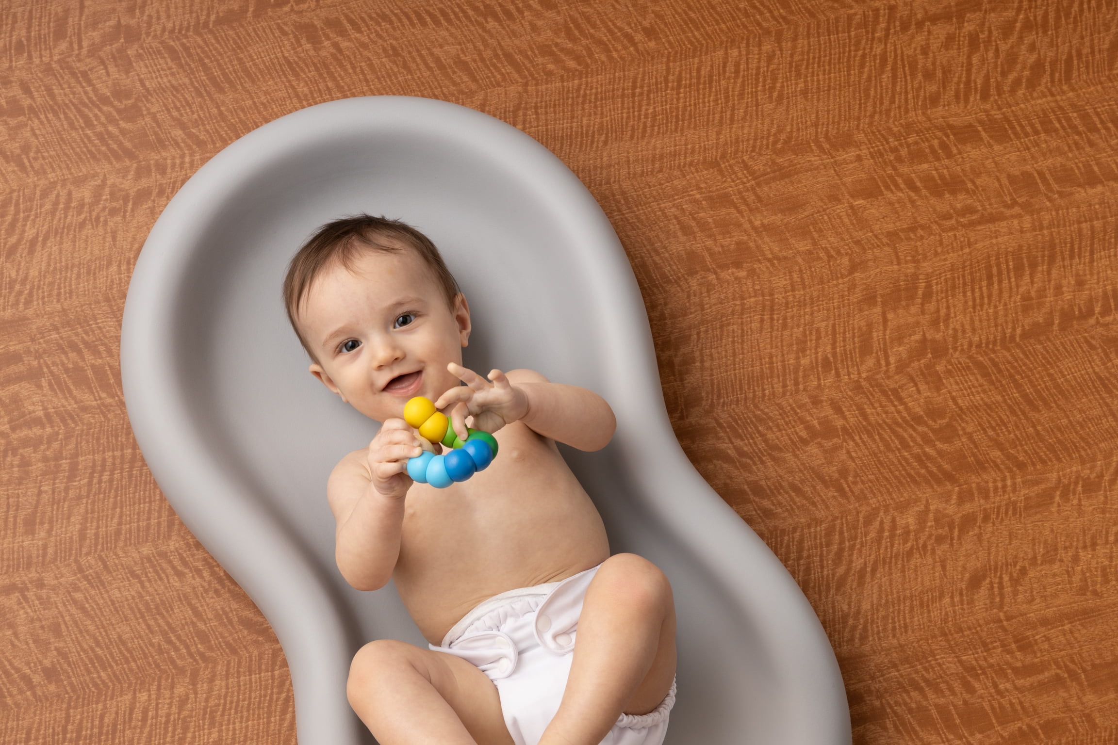 Peanut® Changer – The Original Made in USA Easy-to-Clean Changing pad and The only Shell Over Foam, Fully impermeable to Fluid - Gray
