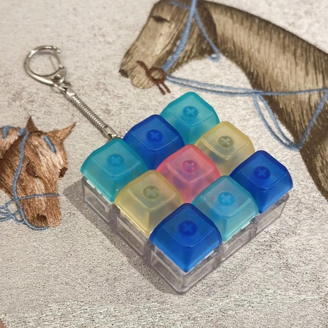 Juguete antiestrés con teclado mecánico de 9 teclas, llavero con tecla, regalo de bolsillo para niños y adultos.