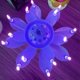 thumbnail image 1 of Vela giratoria con forma de loto y forma de pastel para fiesta de cumpleaños, vela con forma de flor mágica - 9192339805218 púrpura, 1 of 5