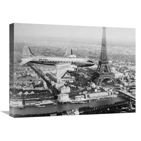 Global Gallery's 'Airplane over Paris' by Anonymous Stretched Canvas Wall Art