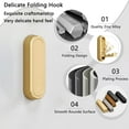 thumbnail image 2 of 4PCS Folding Coat Hook, Heavy Duty Wall Hooks Made of Zinc Alloy, Foldable Gold Wall Hooks for Hanging Coats, Scarves, Hats, Bathrobes, Keys, Bags (Gold), 2 of 8