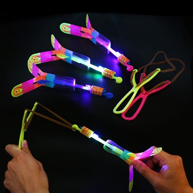 Jinsinto 10 Pcs Flèche Lumineuse LED Incroyable Fusée Rotative Jouets Volants pour Enfants Jouet Clignotant Flèche