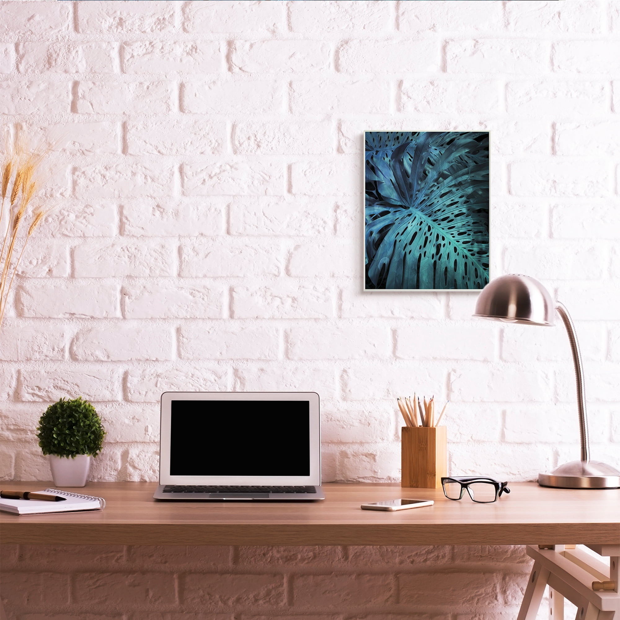 Blue Tropical Palm Leaves Dark Forest Plants 13 in x 19 in Framed Photography Art Prints, by Stupell Home Décor