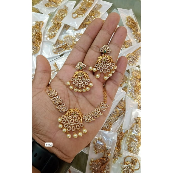 Peacock Matte Gold Finish Haram Necklace Set – South Indian Temple Jewelry with White & Green CZ Stones
