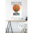 thumbnail image 2 of NBA Milwaukee Bucks - Drip Ball 20 Wall Poster with Wooden Magnetic Frame, 22.375" x 34", 2 of 5