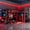Red, variant on Twin Size L-Shaped Gaming Loft Bed with RGB LED Lights, Dual Twin Beds, USB Charging Ports & TV Stand, Wood Loft Bedframe Playhouse Bed with Storage Shelves & Reversible Layout