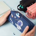 thumbnail image 3 of Get Ready for Blast Off with Our Space Astronaut Portable Pencil Case - Double-Layered, Large Capacity, and Adorably Cute Cartoon Animal Design - Perfect for School Supplies Storage and Gift Giving!, 3 of 4