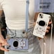 thumbnail image 2 of Funda de teléfono con cordón cruzado de astronauta para iPhone 13, 12, 11, 14 Pro Max, XR, XS Max, X, 7, 8, 6, 6S Plus, Mini funda de silicona con soporte Fivean unisex, 2 of 2