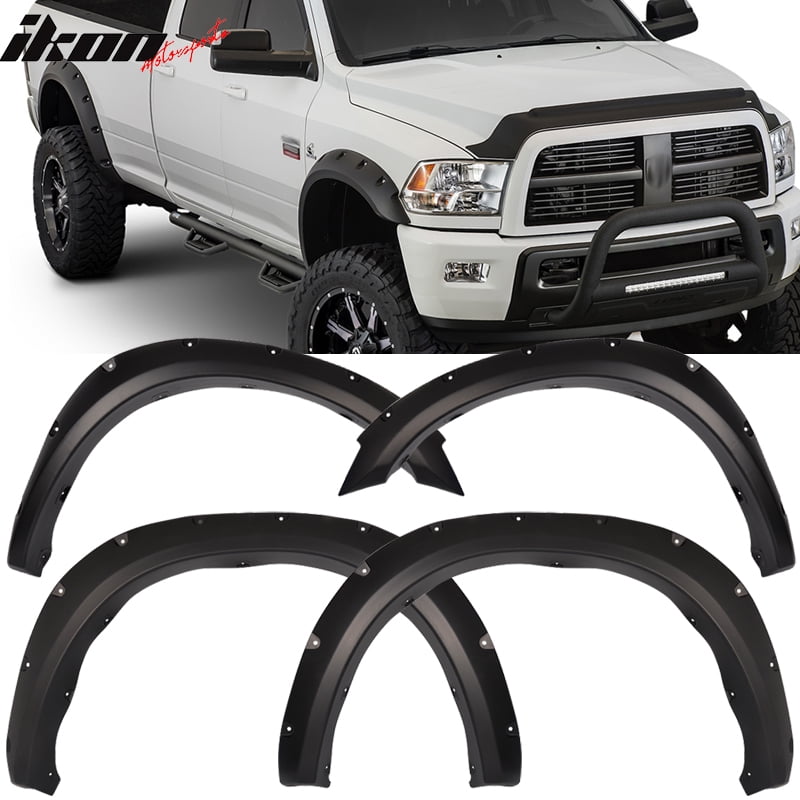 white dodge ram with black fender flares