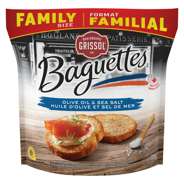 Grissol Baguettes Family Pack Olive Oil & Sea Salt featuring toasted round baguette breadsticks with a crispy texture on a wooden surface, one topped with cream cheese, smoked salmon, and dill, made in Quebec with no artificial flavours or colours, ideal as a snack or with cheese and spreads.