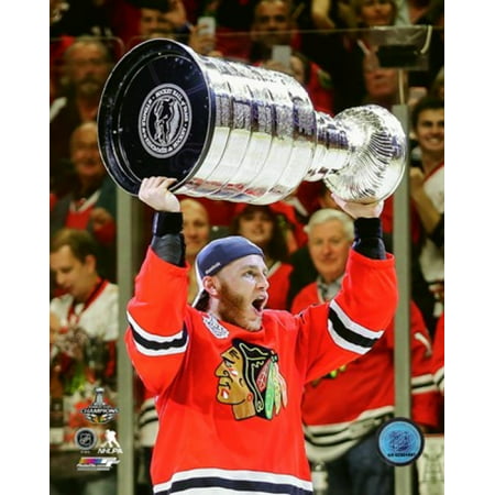Patrick Kane with the Stanley Cup Game 6 of the 2015 Stanley Cup Finals Sports