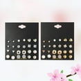 thumbnail image 3 of Juego de 24 pares de pendientes triangulares con forma de corazón para mujer, elegante accesorio para piercings (dorados y plateados)., 3 of 7