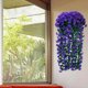 thumbnail image 1 of Cesta de flores colgante de glicinia artificial – Guirnalda de orquídea de seda violeta falsa para decoración de paredes y puertas, arco de boda, decoraciones para el hogar y el jardín, 1 of 7