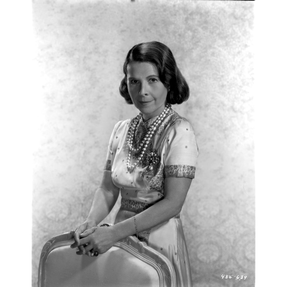 ruth gordon on a silk dress standing behind chair portrait photo ruth gordon on a silk dress standing behind chair portrait photo
