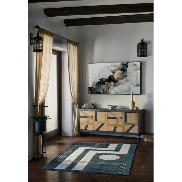 ECARPET Erisa contemporary area rug with blue and white geometric design on wooden floor in a stylish living room with modern sideboard and abstract wall art.