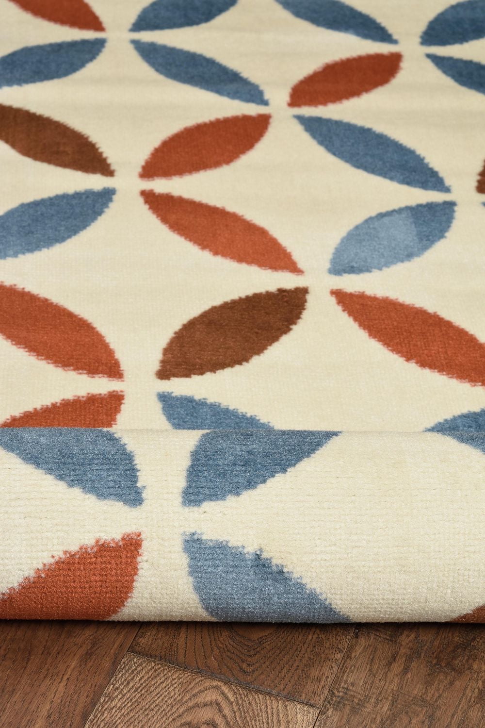 Tapis Capri Conrad os & bleu de 6 pi 5 po x 9 pi 3 po