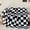 Black, variant on WYSHOP Buffalo Plaid Flannel Fleece Throw Blanket for Couch | Ultra Soft Lightweight, Classic Plaid Design, Farmhouse Home Decor, for Sofa, Bed & Gift Giving, Pink & White, 50x60 Inches