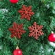thumbnail image 1 of Paquete de 3 Copos de Nieve Navideños Brillantes de Doble Cara (10 X 10 Cm) - Colgantes de Plástico Rojo y Dorado para Árbol de Navidad y Fiestas, 1 of 6