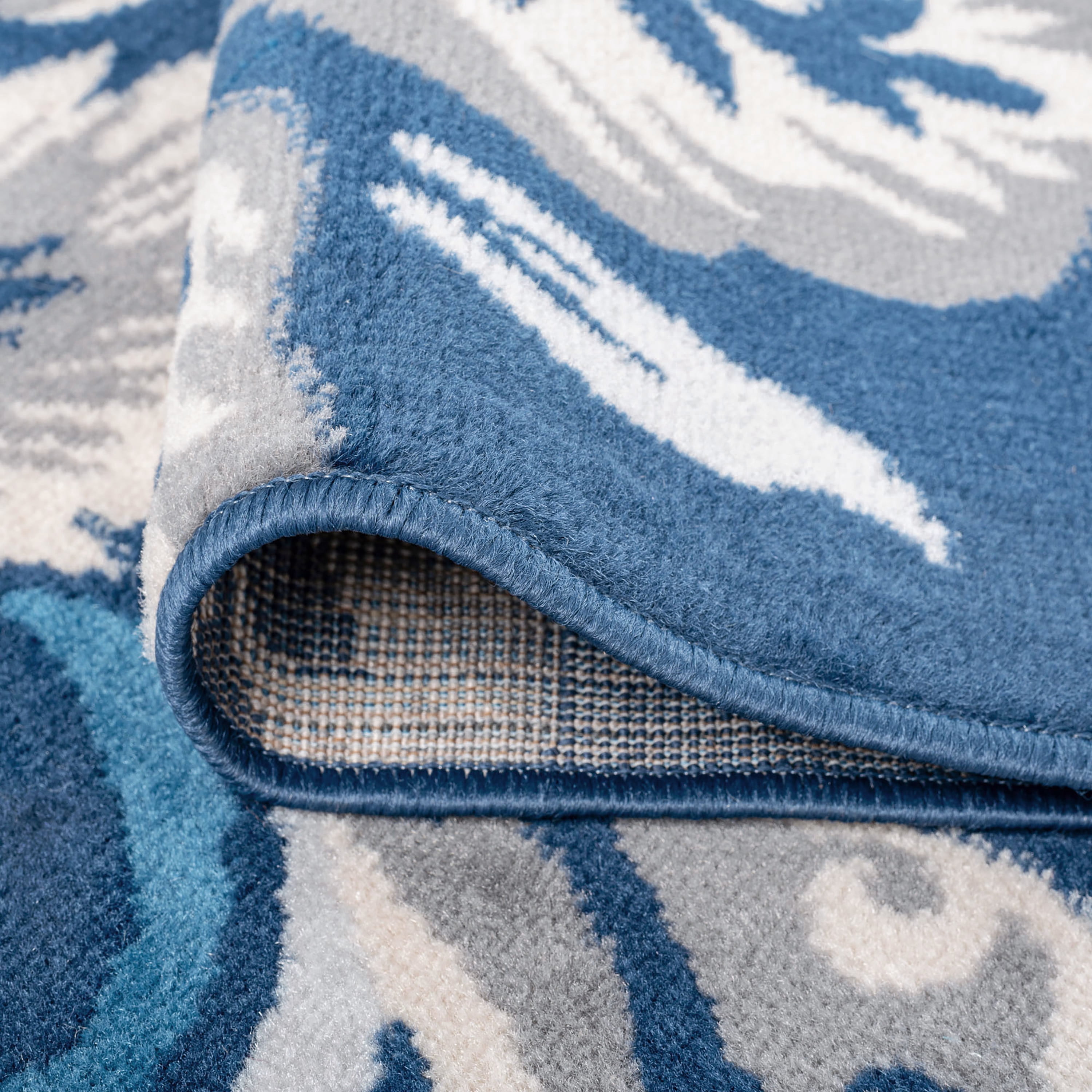 Madison Traditional 5' x 7' Dark Blue Polypropylene Indoor Area Rug