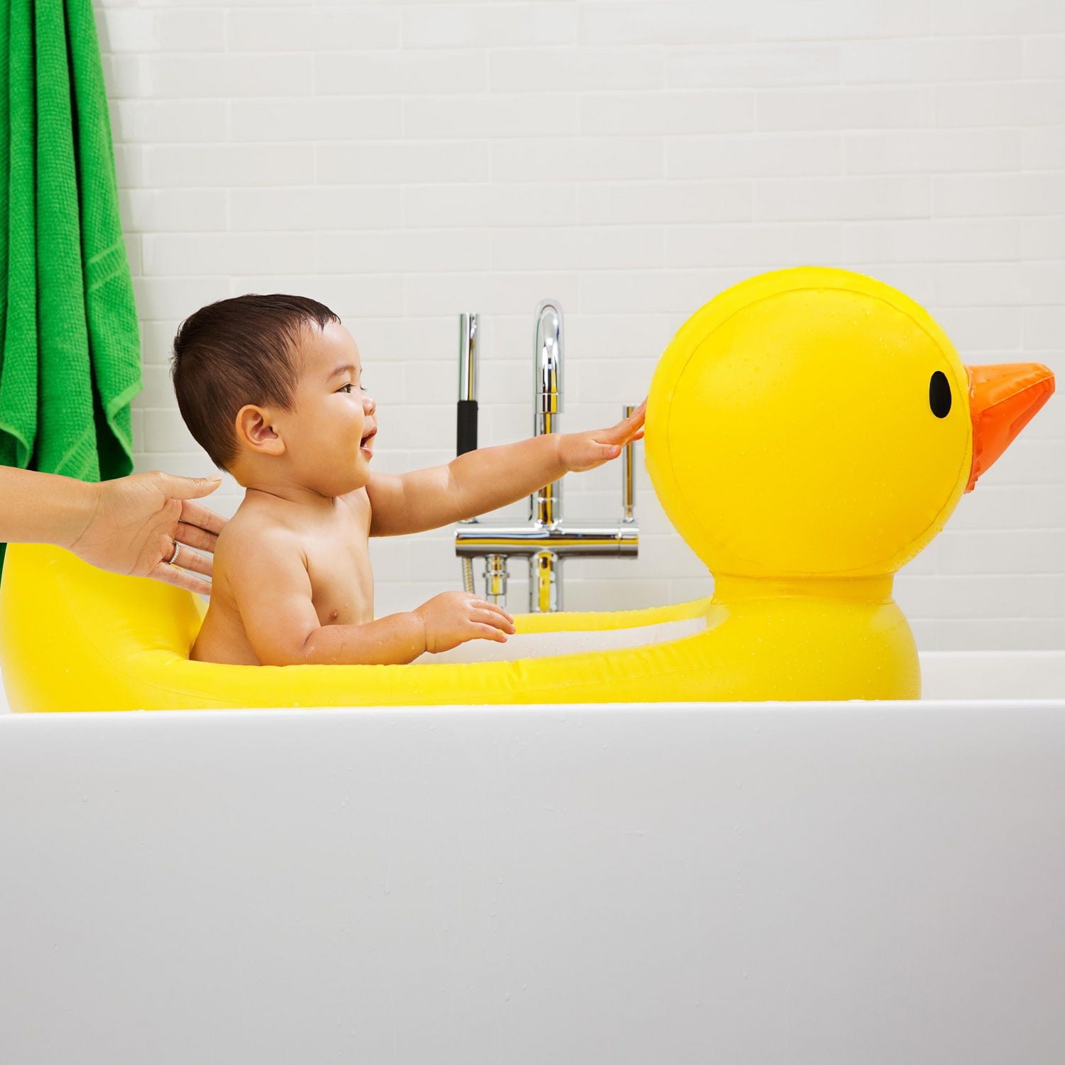 Munchkin White Hot Inflatable Duck Safety Baby Bath Tub, Includes White Hot Technology and Drain Hole, Non-Slip Surface and Contoured Headrest, Yellow