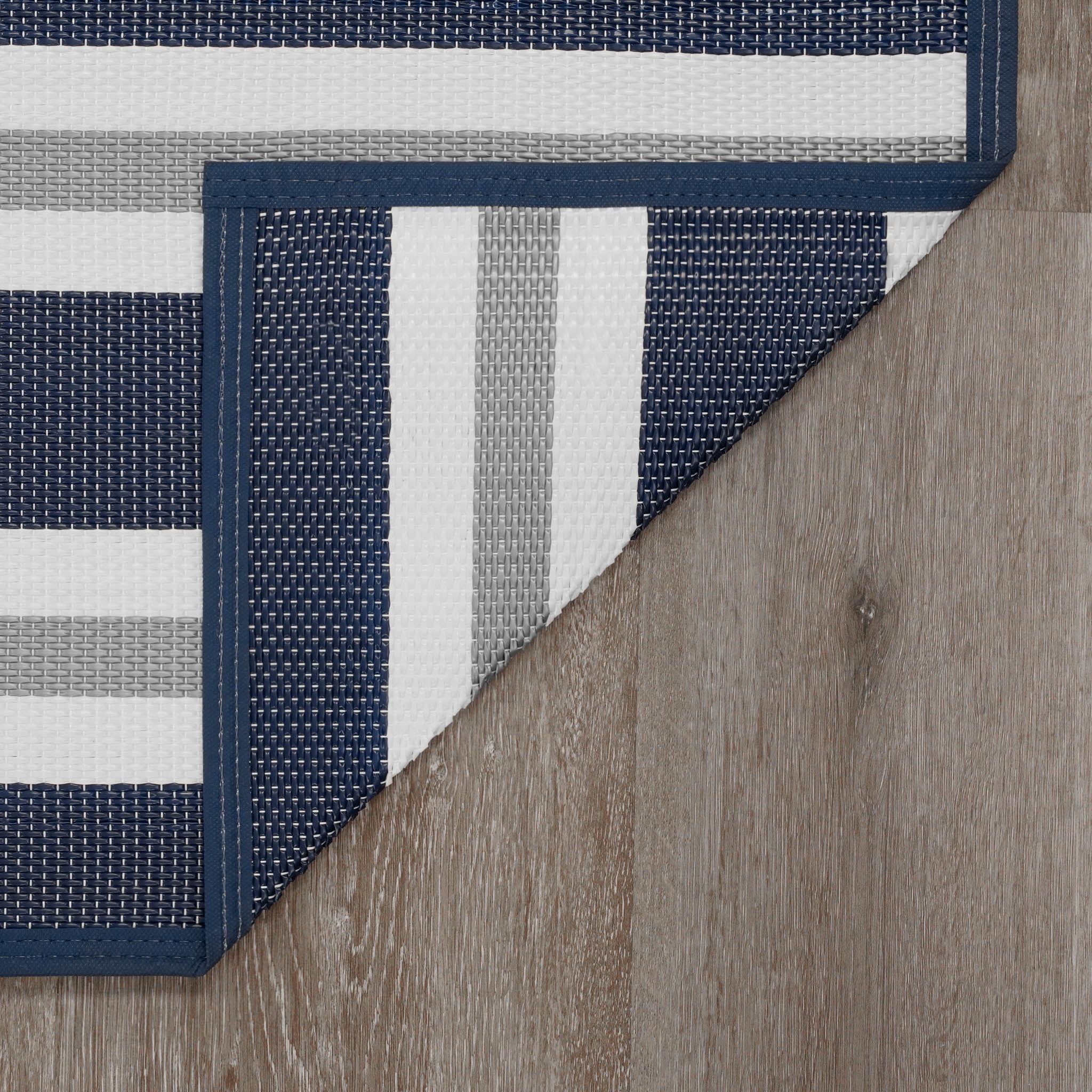 Luna Contemporary Stripe Navy and Gray Polypropylene Reversible Plastic Straw Outdoor Area Rug, 7'11'' x 10'3'' Rectangle