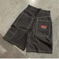 thumbnail image 1 of Pantalones cortos de mezclilla sueltos con diamantes de imitación y diseño de rock gótico para hombre, estilo hip hop Y2K, lavados con ácido, cintura alta, pierna ancha, 1 of 4