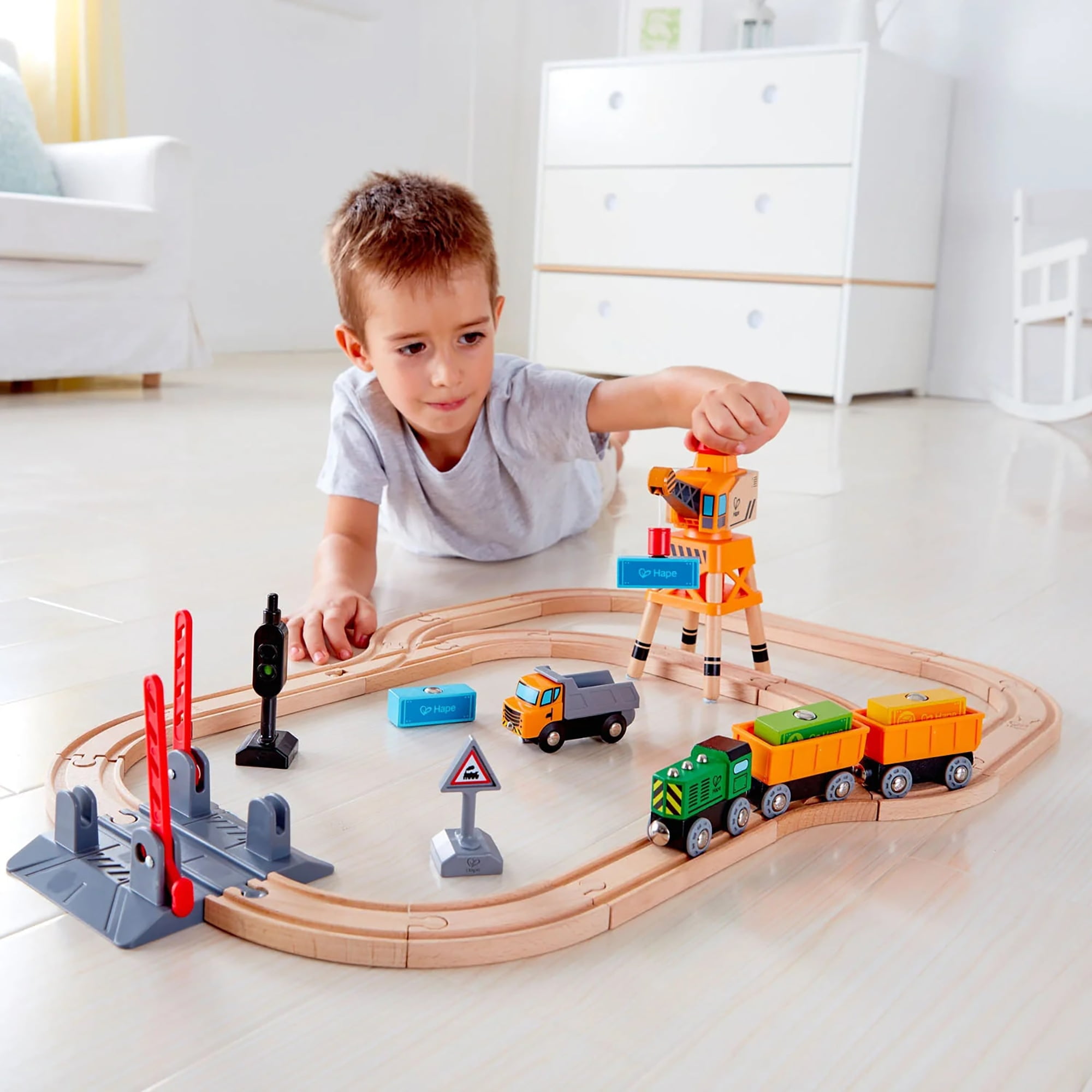 Hape: Crossing & Crane Set - 32pc Wooden Train Cargo Railroad Yard, Magnetic Linking Trains, Crane To Grab & Move Cargo, Accessories, Kids Ages 3+