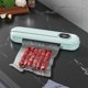 thumbnail image 1 of Selladora al vacío | Sistema automático de conservación de alimentos con sellado continuo | Compacta para almacenar en la cocina | Incluye 10 bolsas, 1 of 6