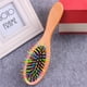 thumbnail image 2 of Peine de madera de Higo con almohadilla de aire para masaje capilar, diseño ergonómico y púas negras circulares. Ideal para cuidado del cabello y reducción de estática., 2 of 6