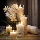 thumbnail image 5 of Juego de 12 velas de pilar blancas con jarrones cilíndricos de vidrio, 5 of 7