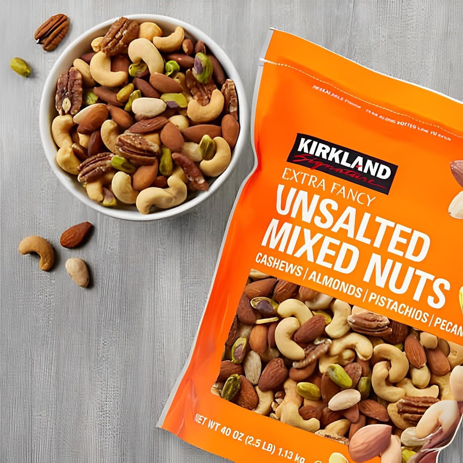 Kirkland Signature Extra Fancy Mixed Nuts Unsalted and Shelled 40 oz (Pack of 4), 1 Pack of Roasted Virginia Peanut Also Included by