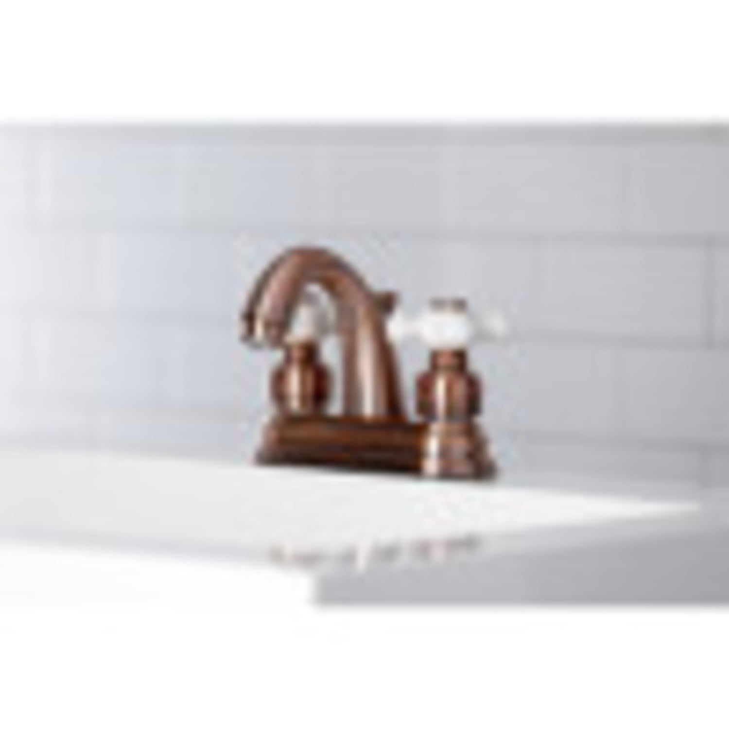 Kingston Brass KB561PXAC Restoration 4 in. Centerset Bathroom Faucet, Antique Copper
