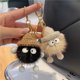 thumbnail image 5 of Llavero con colgante de bola de carbón pequeña de piel de visón y conejo, gafas de sol con forma de monstruo y bolso bonito, 5 of 5