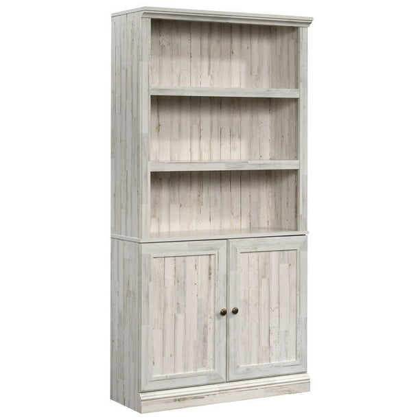 You'll want to run google shopping ads for high intent keywords like bookcases for sale. sauder misc storage 3 shelf 2 door tall wood bookcase in white plank